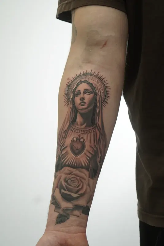 Black & gray tattoo by Casa Ink
